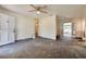 Open living room with neutral walls, ceiling fan, and potential for customization at 6730 10Th Avenue S Ter, St Petersburg, FL 33707