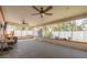 Screened sunroom with fans and views of the backyard at 6730 10Th Avenue S Ter, St Petersburg, FL 33707