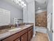 Bathroom featuring double sinks with a shower/tub combination at 8332 Swiss Chard Cir, Land O Lakes, FL 34637