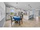 Kitchen features granite countertops, a large island with bar stool seating, and a breakfast nook at 8332 Swiss Chard Cir, Land O Lakes, FL 34637