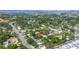 Aerial view showing the property surrounded by lush greenery in a residential neighborhood at 914 Sandpiper Way S, St Petersburg, FL 33707