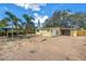 Wide view of backyard brick pavers and covered gazebo at 914 Sandpiper Way S, St Petersburg, FL 33707