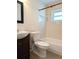 Cozy bathroom features tiled shower over tub, and a modern vanity at 9218 40Th N Way, Pinellas Park, FL 33782