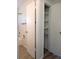 Bathroom with linen closet, shower, and tiled floors at 9218 40Th N Way, Pinellas Park, FL 33782