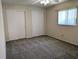 Bedroom features carpet flooring, a ceiling fan, and a window for natural light at 9218 40Th N Way, Pinellas Park, FL 33782