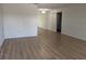 Spacious living room featuring light wood flooring and neutral wall colors at 9218 40Th N Way, Pinellas Park, FL 33782