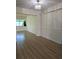 Living room with hard surface floors, crown molding, and lots of natural light at 9218 40Th N Way, Pinellas Park, FL 33782