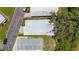 An aerial view of a mobile home in a well-maintained community with mature landscaping and paved streets at 9790 66Th N St # 353, Pinellas Park, FL 33782