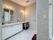 Bathroom features vanity with lots of storage, neutral walls and floors and vanity lighting at 9790 66Th N St # 353, Pinellas Park, FL 33782