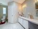 Bathroom featuring lots of storage, single sink vanity, neutral color scheme and tiled floors at 9790 66Th N St # 353, Pinellas Park, FL 33782