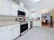Bright kitchen featuring stainless steel appliances and light countertops at 9790 66Th N St # 353, Pinellas Park, FL 33782