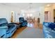 Bright, open-concept living and dining area featuring hardwood floors and ample space at 9790 66Th N St # 353, Pinellas Park, FL 33782