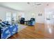 Spacious living room area with hardwood floors and an open layout for seamless living at 9790 66Th N St # 353, Pinellas Park, FL 33782