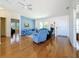 Cozy living room area with hardwood floors and an open layout for easy flow at 9790 66Th N St # 353, Pinellas Park, FL 33782