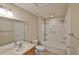 This bathroom features a vanity, toilet, and a shower-tub combo at 10132 Post Harvest Dr, Riverview, FL 33578