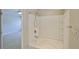 Clean bathroom with a white tub-shower combination and chrome fixtures at 10132 Post Harvest Dr, Riverview, FL 33578