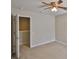 Beige bedroom featuring neutral carpet and a closet at 10132 Post Harvest Dr, Riverview, FL 33578