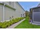 Exterior shot of home with lush landscaping at 10132 Post Harvest Dr, Riverview, FL 33578