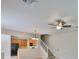 Open-concept living space featuring stairs, dining space, and open kitchen view at 10132 Post Harvest Dr, Riverview, FL 33578