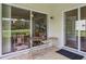 Covered patio with outdoor furniture and sliding glass doors at 10559 Coral Key Ave, Tampa, FL 33647