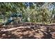 A colorful community playground for , set amidst trees and offering recreational space at 10559 Coral Key Ave, Tampa, FL 33647