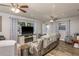 Relaxing living room space with comfortable seating, a fireplace, and modern design at 1144 Woodbrook Dr, Largo, FL 33770