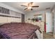 This main bedroom features an updated ceiling fan and light fixture plus plenty of storage at 1144 Woodbrook Dr, Largo, FL 33770