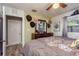 Bedroom with decorative dresser and mirror, and window bringing in natural light at 1144 Woodbrook Dr, Largo, FL 33770