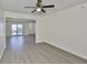 Spacious living room featuring new vinyl flooring and lots of natural light at 1210 Eastloch Ct, Sun City Center, FL 33573