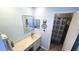 Bathroom featuring a vanity with storage and a shower with blue patterned shower curtain at 13 Windrush Bay Dr, Tarpon Springs, FL 34689