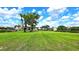 Expansive green space within the community with walking paths at 13 Windrush Bay Dr, Tarpon Springs, FL 34689