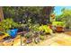 Close up of potted plants and landscaping accents on the beautiful tile patio at 13 Windrush Bay Dr, Tarpon Springs, FL 34689