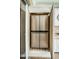 The kitchen has a stainless steel four door refrigerator recessed in a cabinet for a seamless look at 1303 Forestedge Blvd, Oldsmar, FL 34677