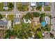Aerial view of the property in a neighborhood, highlighting its location and lot boundaries at 1309 11Th W Ave, Palmetto, FL 34221