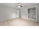 Simple bedroom with tile floor, a closet, and neutral walls at 1309 11Th W Ave, Palmetto, FL 34221