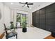 Inviting living room with a textured wall, a ceiling fan, and sliding glass doors to the backyard at 13503 Gopher Pond Ct, Hudson, FL 34669
