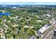 Expansive aerial view of a neighborhood with lush greenery, showcasing the community's proximity to the water and city skyline at 1359 S Michigan Ave, Clearwater, FL 33756