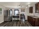 This remodeled kitchen with stainless steel appliances, granite countertops, and wood flooring at 1359 S Michigan Ave, Clearwater, FL 33756