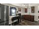 Bright and airy kitchen with stainless steel appliances, granite counters, and wood-look flooring at 1359 S Michigan Ave, Clearwater, FL 33756