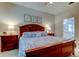Comfortable main bedroom with neutral paint, furnishings, and decor at 14427 Pepperpine Dr, Tampa, FL 33626