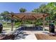 Inviting picnic area featuring shaded pavilion, tables, and nearby playground for outdoor enjoyment at 14427 Pepperpine Dr, Tampa, FL 33626