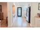 Bright and spacious kitchen with sleek countertops, modern appliances and hardwood floors at 1972 Briarwood St, Dunedin, FL 34698