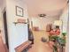 Bright living room with hardwood floors, modern furnishings, and cozy seating at 1972 Briarwood St, Dunedin, FL 34698