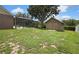 View of the backyard showing a shed and screened-in pool area at 22431 Panther Run Ct, Land O Lakes, FL 34639