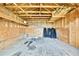 Interior view of a storage shed with wood construction and shelving at 22431 Panther Run Ct, Land O Lakes, FL 34639