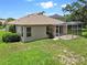 Nice backyard featuring screened lanai, providing a comfortable outdoor living space at 2544 Rosehaven Dr, Wesley Chapel, FL 33544