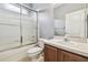 Bathroom features a shower over tub, vanity with wood cabinets, and neutral finishes at 2544 Rosehaven Dr, Wesley Chapel, FL 33544
