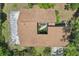 Unique aerial perspective of a home featuring a brown roof and courtyard at 2896 Grand Cayman St, Sarasota, FL 34231