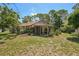 Enjoy the outdoors on this property's screened-in lanai with a spacious backyard at 2896 Grand Cayman St, Sarasota, FL 34231