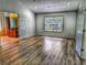 Spacious bedroom with hardwood flooring and ample natural light at 29916 Cedar Waxwing Dr, Wesley Chapel, FL 33545